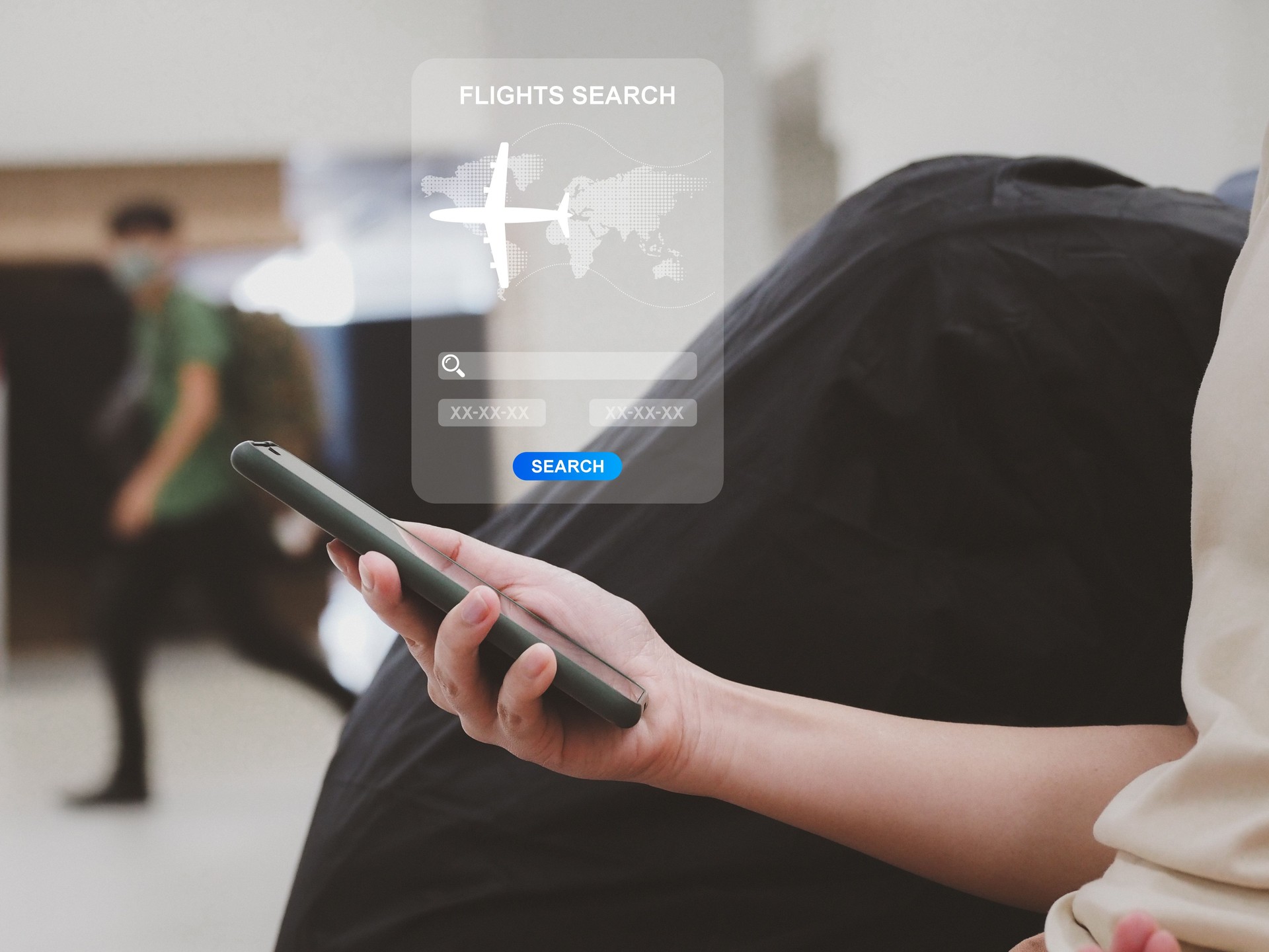 Search for travel dates through an application on a smartphone to book a plane ticket.